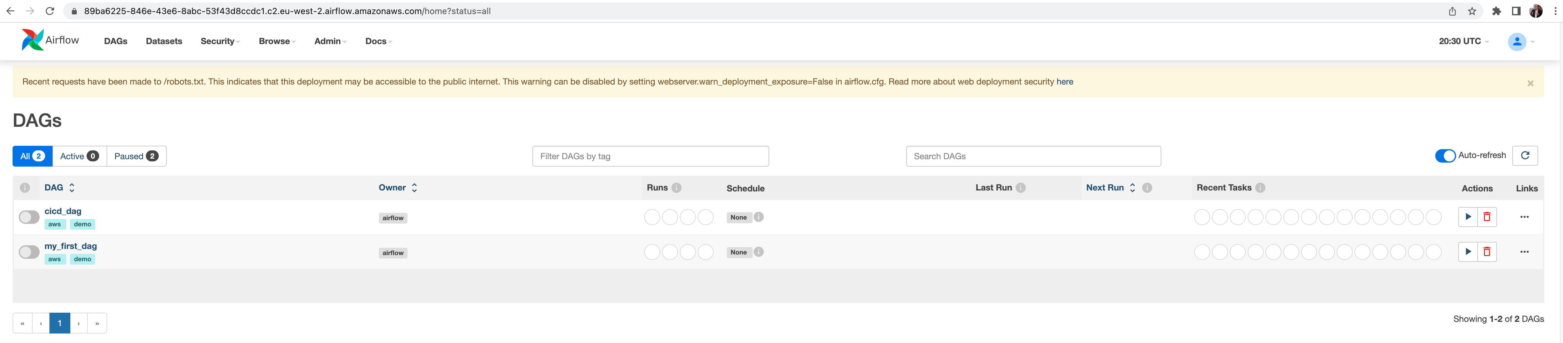 The Apache Airflow UI showing two DAGs now in the console